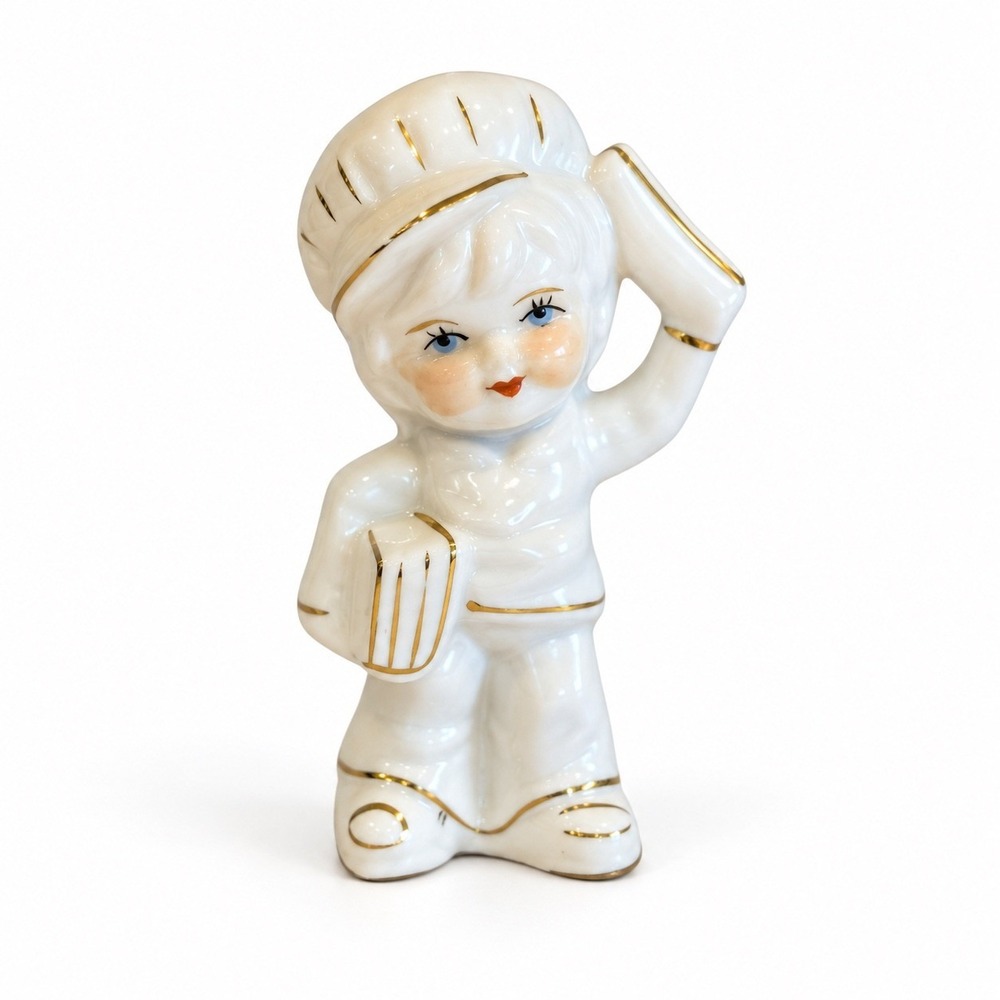 Vintage Porcelain Newspaper Boy Figurine White Gold Gilt Trim 4.5". Post war era